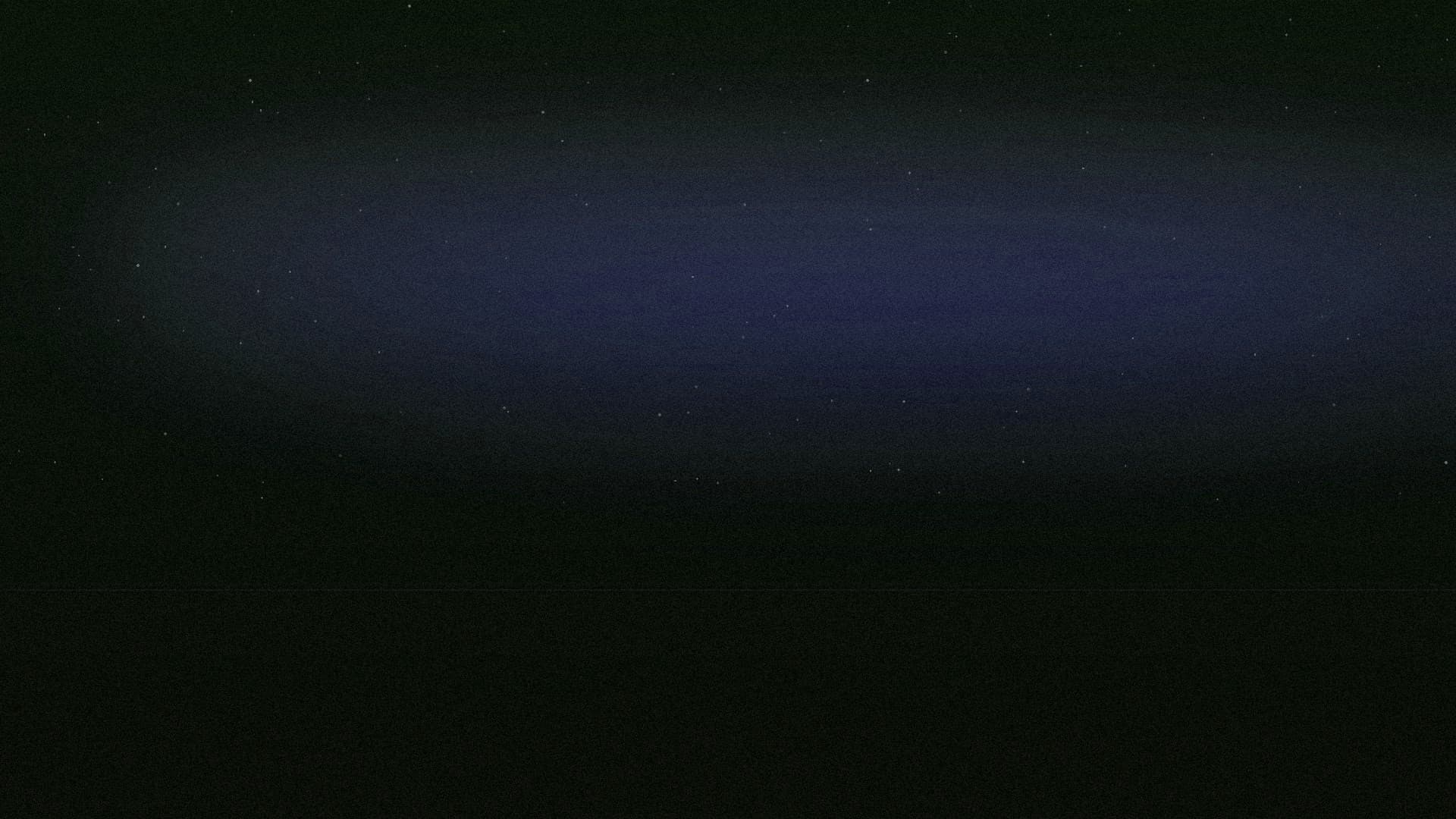 Campo de luz azul sobre un horizonte oscuro